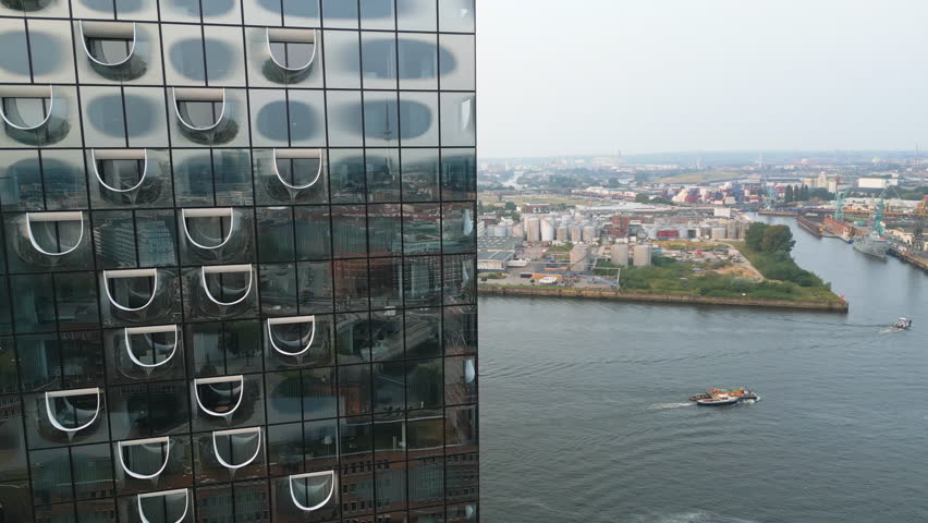 Aerial footage of harbor, Elbphilharmonie, Hafencity and downtown in Hamburg, Germany, Europe