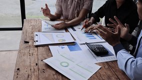 Business People Meeting using chart graph calculator, laptop computer,stock market chart paper for analysis Plans to improve quality next month, Conference Discussion Corporate Concept.	 - Powered by Shutterstock - Get 15% off with code: PIKWIZARD15