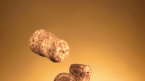 Corks from New Year s Champagne Bottles Launch into the Air Against a Bright Yellow Background, Capturing the excitement of New Year s celebrations, champagne corks soar upwards in slow motion - Powered by Shutterstock - Get 15% off with code: PIKWIZARD15
