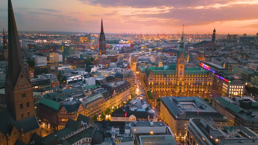 Hamburg city skyline aerial view drone footage of night Hamburg germany old town town hall and main sqaure in city centre.