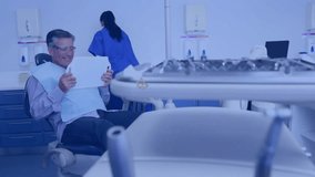 Medical network and data processing animation over man sitting in dental clinic. Healthcare, technology, digital, dentist, patient, monitor - Powered by Shutterstock - Get 15% off with code: PIKWIZARD15