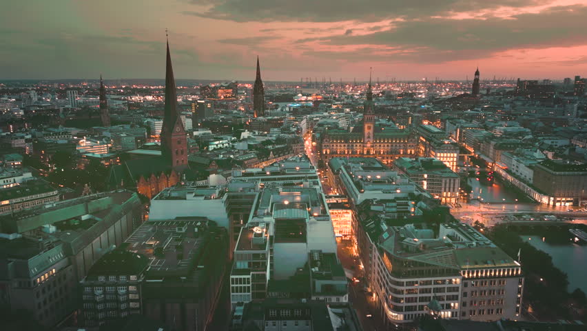 Hamburg night aerial skyline top view drone footage of city hamburg germany in front hamburg town hall, main sqaure church and cathedral.