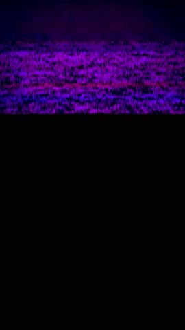 VHS noise and artifacts, including blue glitches from an old recording. Vertical background.