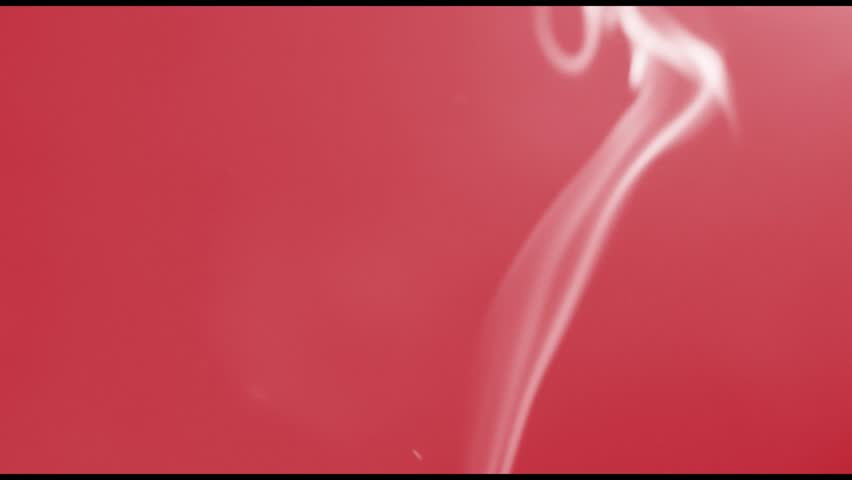 White smoke on a red background, may be used as a background footage.