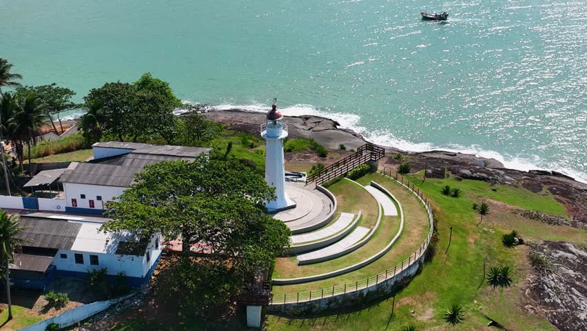 Santa Luzia Lighthouse At Vitoria Espirito Santo Brazil. Lighthouse Standing Tall On Beach With Ocean Waves Crashing. Business Sky Downtown Cityscape. Backgrounds Up Above. Vitoria Espirito Santo.