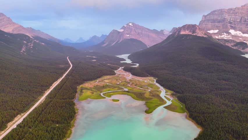 Top Cinematic Aerial view to the Jasper National Park, Alberta. Waterfowl Lakes aerial view. Canadian wild nature and landscape from above. Drone footage