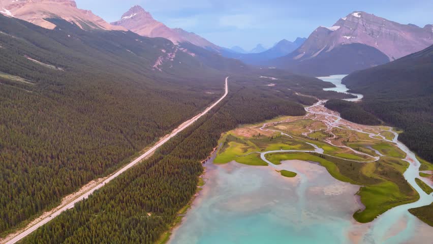 Top Cinematic Aerial view to the Jasper National Park, Alberta. Waterfowl Lakes aerial view. Canadian wild nature and landscape from above. Drone footage