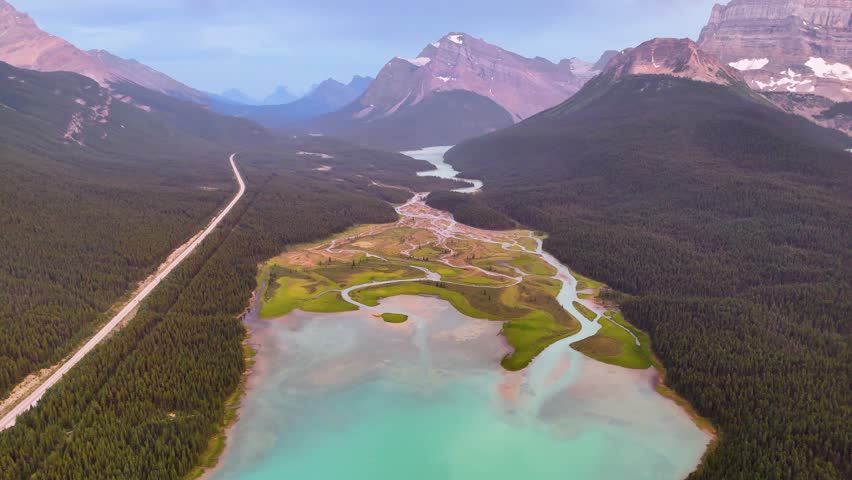 Top Cinematic Aerial view to the Jasper National Park, Alberta. Waterfowl Lakes aerial view. Canadian wild nature and landscape from above. Drone footage