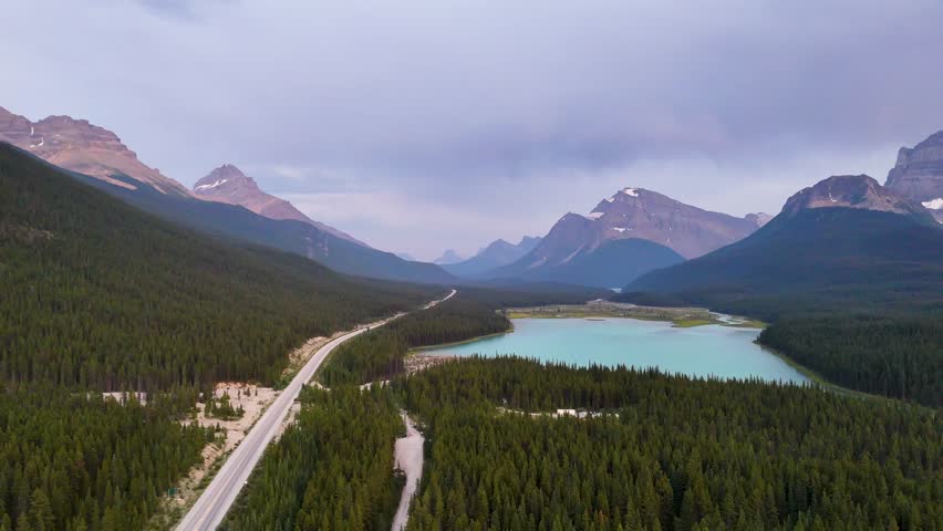Top Cinematic Aerial view to the Jasper National Park, Alberta. Waterfowl Lakes aerial view. Canadian wild nature and landscape from above. Drone footage