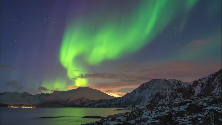 Tromso Norway time lapse of the aurora borealis northern lights winter landscape at Rorvikneset Sommaroy