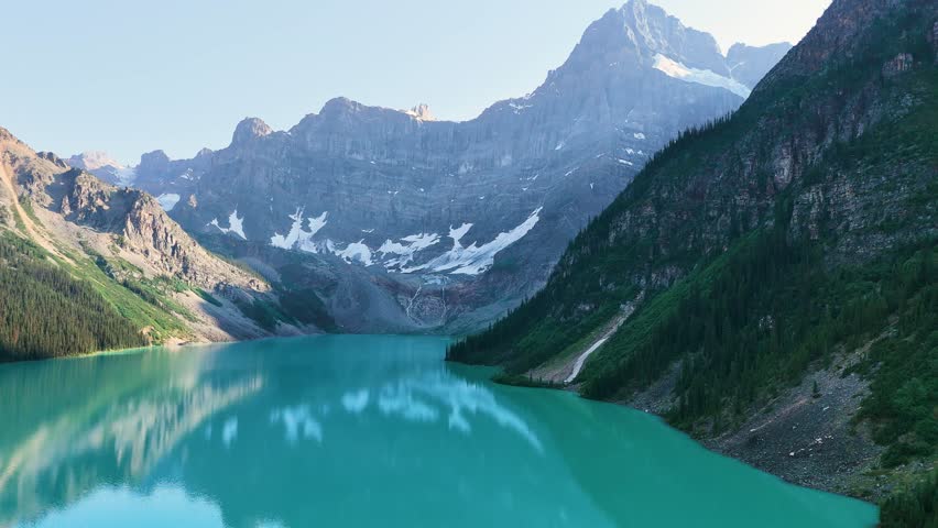 Rocky Mountains, Canada. Top cinematic aerial view. Chephren Lake, Jasper National Park, Alberta. 4K drone footage. Canadian wild nature and landscape from above