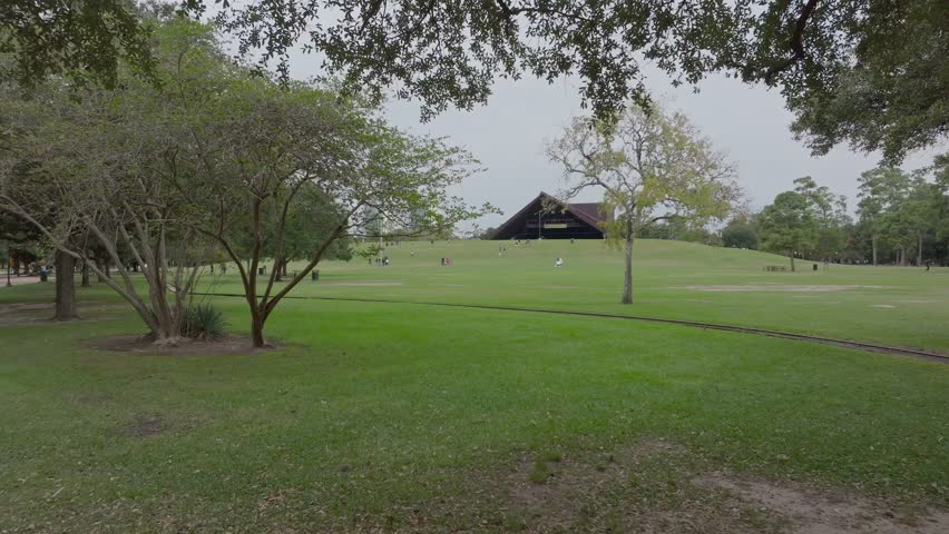 Ground shot of Hermann Park in Houston, TX on a cloudy day