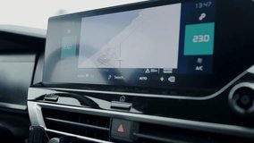 Close-up of an advanced car navigation system display with real-time speed and map information. This dashboard technology enhances modern driving by providing essential data and GPS navigation. - Powered by Shutterstock - Get 15% off with code: PIKWIZARD15