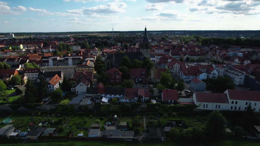 A wide Aerial view of the old town of the city Haldensleben on a late summer afternoon in Germany.