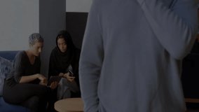 Speaking into smartphone, man with financial data processing animation over him. Business, technology, communication, finance, analysis, mobile - Powered by Shutterstock - Get 15% off with code: PIKWIZARD15