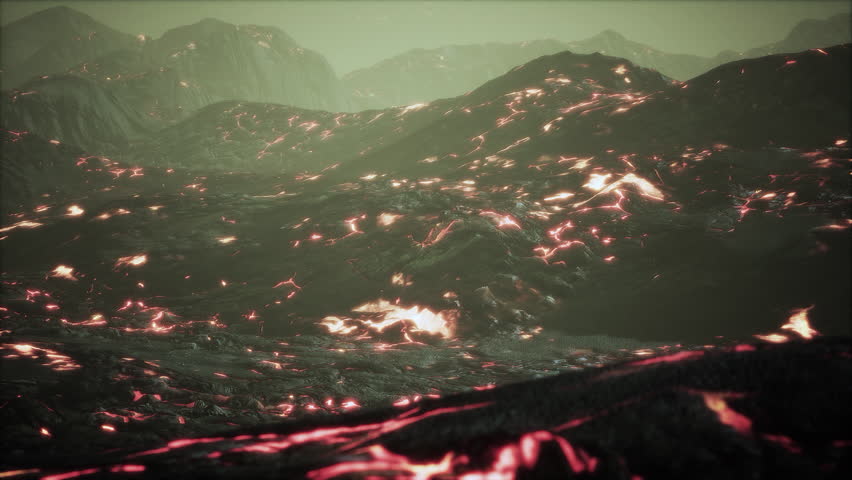 black lava field with hot red orangelavaflow at sunset
