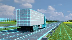 Smart Logistics: Generic autonomous semi truck with cargo trailer driving through green landscape. Scanning and digitalizing effetcs. Future Technology Concept. 3D animation rendering - Powered by Shutterstock - Get 15% off with code: PIKWIZARD15