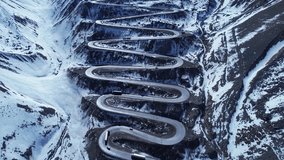 Curves Road Scenery At Andes Mountains Santiago Chile. Breathtaking Aerial View Of Busy Traffic In A Freeway Road. Nature Tourism Icon Snow Covered Forest Trees. Landmark Snow Covered Above View. - Powered by Shutterstock - Get 15% off with code: PIKWIZARD15