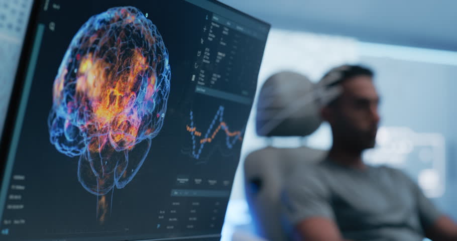 Futuristic Laboratory: Patient Wearing Headset, Research Shows Brain Activity During Scanning. Monitor and Display Show Illuminated Neural Pathways, Innovation in Cognitive Research and Diagnostics