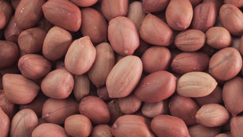 Red Peeled Peanut Close Up Background Texture
