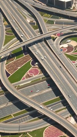 Aerial view of road junction in Dubai. Vertical video