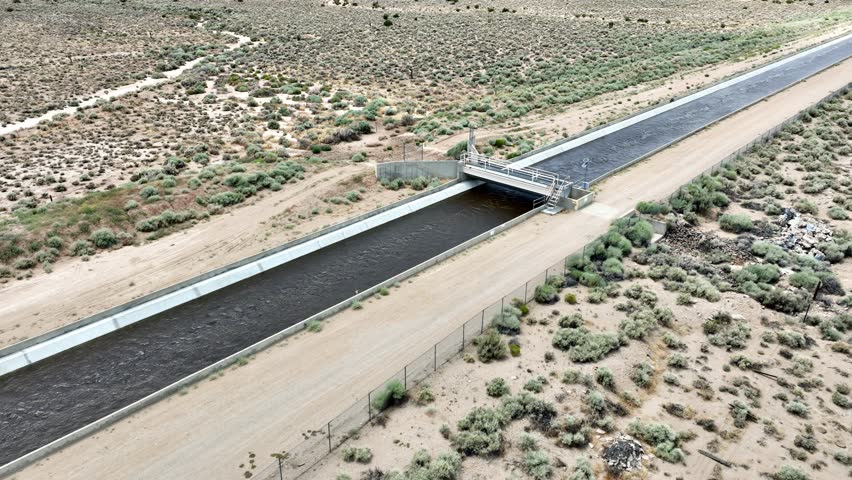 Aerial shot of the Los Angeles Aqueduct running through Owen’s Valley at the base of the Sierra Nevada Mountains in California. The aqueduct supplies water to Los Angeles and Southern California.