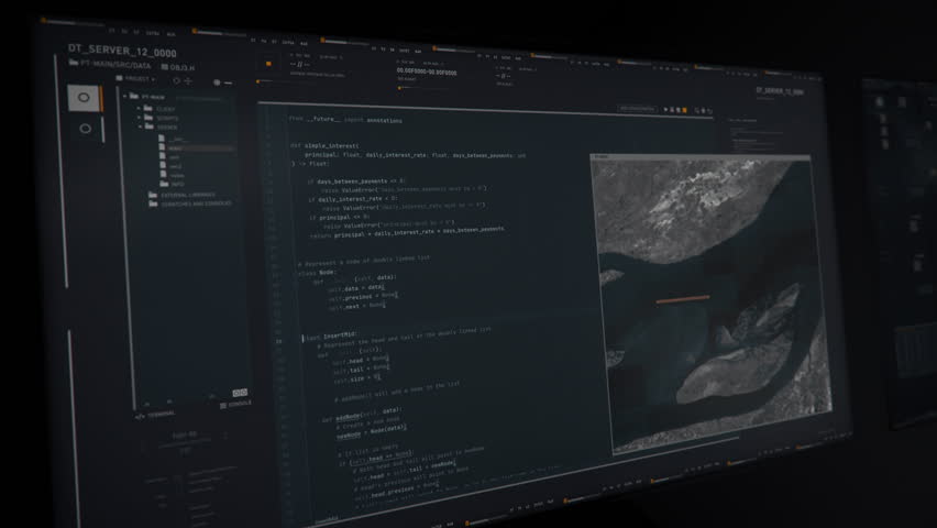 Programmer using the modern software development network. Developing the virtual world inside of the software network. Typing a code to recreate the area in the software development network.