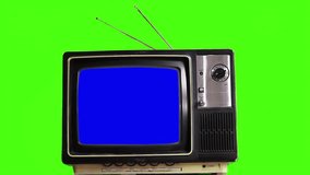 Vintage 1980s TV with Blue Static Screen Against Green Chroma Key Background - 4K Resolution - Powered by Shutterstock - Get 15% off with code: PIKWIZARD15