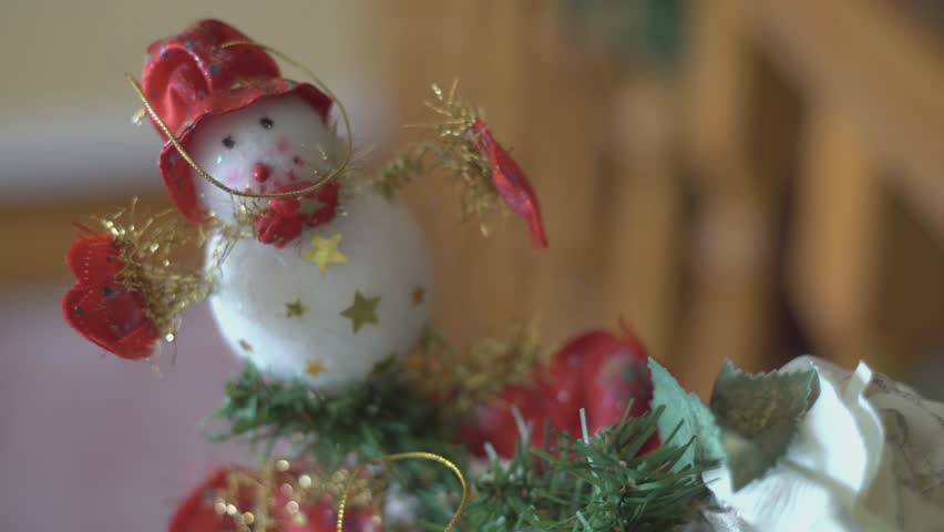 Detailed Close Up of Christmas Decorations Highlighting Festive Ornaments, A close up view of Christmas decorations, focusing on the intricate details of festive ornaments that bring warmth