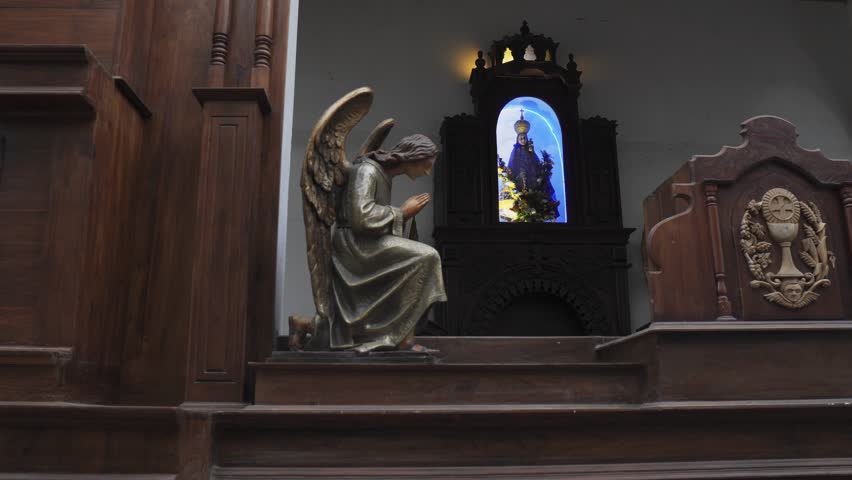 Church interior in Sri Lanka with statues and sculptures
