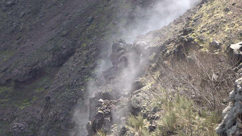 Close-up of smoke billowing from Mount Vesuvius volcano, nature and travel Italy
