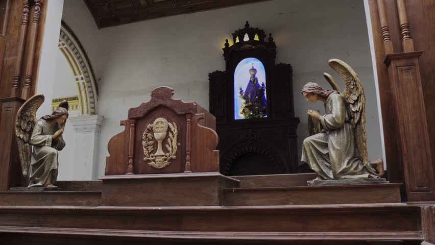 Church interior in Sri Lanka with statues and sculptures
