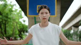 Two young asian women friends in sportswear playing basketball game on playground on summer day, Sport, active lifestyle concept. - Powered by Shutterstock - Get 15% off with code: PIKWIZARD15