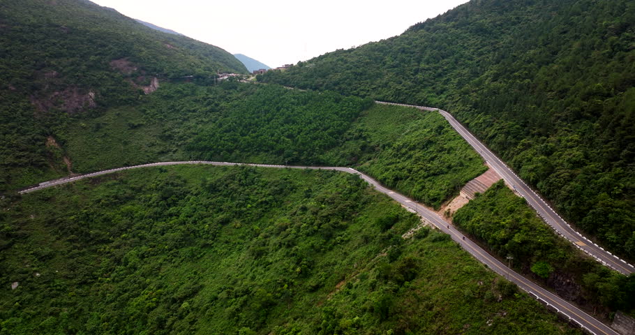 Hai Van Pass Road Over The Mountains Between Danang And Hue In Central Vietnam. Aerial Shot