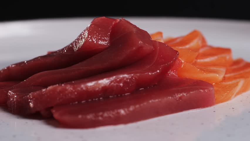 Sashimi Platter, japanese sushi restaurant, Fresh Tuna and Salmon Slices in modern cafe, traditional food, raw red fish dish, omega 3.