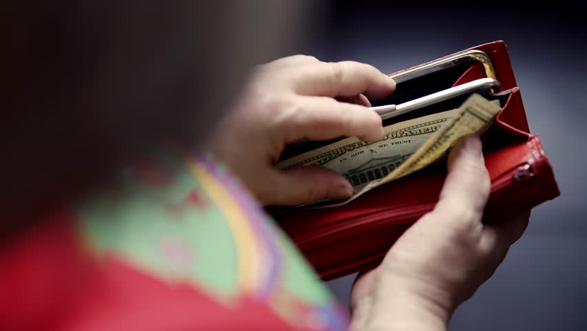 Counting Currency US Dollar Bills.Calculating Home Expenses And Taxes.Financial Prospects Counting Cash Money.Family Budget Bankrupt Arrears Showing Empty Wallet.Financial Bill Wallet Financial Crisis