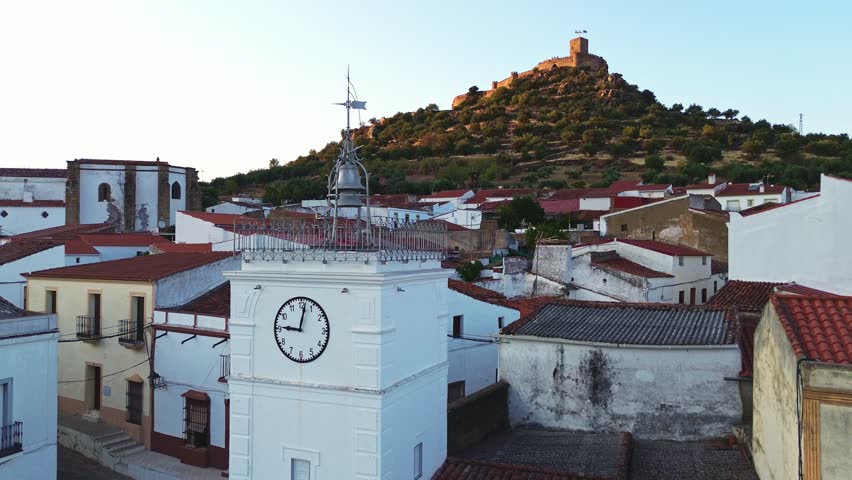 Clock Tower and Miraflores Castle in Alconchel, Badajoz, Extremadura, Spain