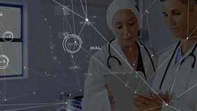 Doctors discussing patient data on tablet with medical network animation. Healthcare, technology, teamwork, innovation, collaboration, communication - Powered by Shutterstock - Get 15% off with code: PIKWIZARD15