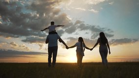 Happy family enjoying fun in nature. Parents lifting child in sunset field. Family bonding in scenic outdoor setting. Concept family nature fun together. Joyful family moments nature. nature adventure - Powered by Shutterstock - Get 15% off with code: PIKWIZARD15