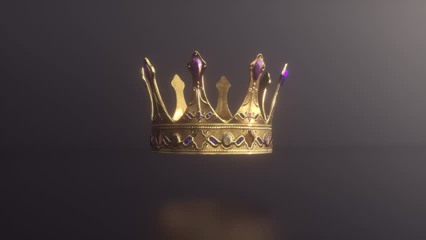 Fabulous golden crown rotating on a dark background. Symbol of monarchy