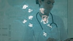 Using tablet, healthcare professional with medical technology icons animation. digital, innovation - Powered by Shutterstock - Get 15% off with code: PIKWIZARD15