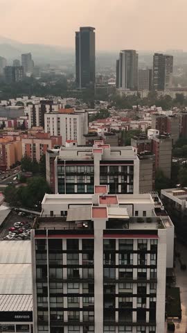 Aerial footage of residential areas, including houses and condominiums, in Coyoacan, CDMX