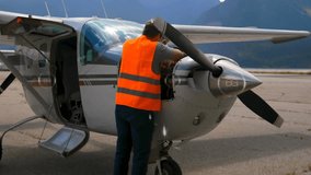 Mechanic working on airplane engine with 6G technology animation over scene. aviation, repair, technician, maintenance - Powered by Shutterstock - Get 15% off with code: PIKWIZARD15