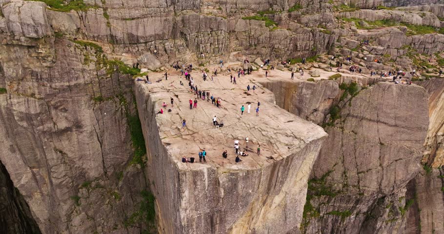 Epic Aerial View of Preikestolen or Pulpit Rock, Norway. Incredible 600m Cliff. Top Norwegian Hiking Destination
