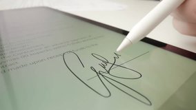 Digital Document Signing Process with Electronic Signature on Tablet - Powered by Shutterstock - Get 15% off with code: PIKWIZARD15