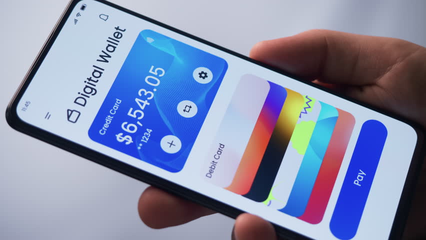 Paying online with a credit card using digital wallet on the smartphone. Choosing from different credit cards for contactless payment. Fictional Interface.