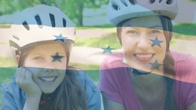 Smiling woman and girl wearing helmets over honduras flag animation. patriotism, family, celebration, safety, happiness, unity - Powered by Shutterstock - Get 15% off with code: PIKWIZARD15