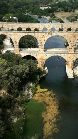 Iconic aerial view of Pont du Gard in France, vertical video