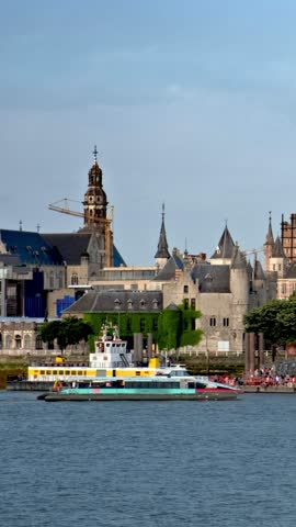 View of Antwerp over the River Scheldt with Cathedral of Our Lady Onze-Lieve-Vrouwekathedraal Antwerpen, Belgium.