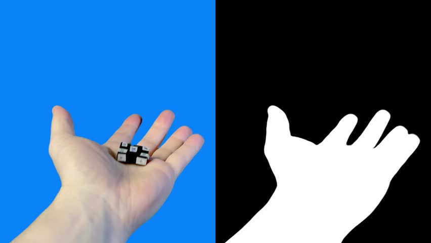4K left Caucasian hand with a black cube on the palm containing black-and-white cross tracking points on the corners and center for virtual object placement, contains chroma key and alpha matte